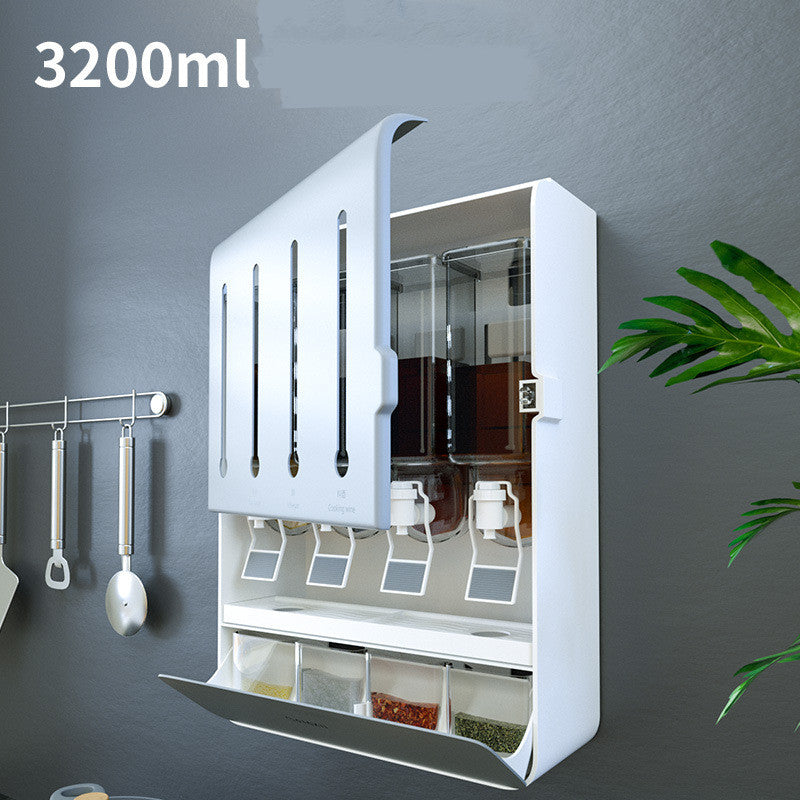 White wall-mounted kitchen organizer with various compartments on a gray wall.