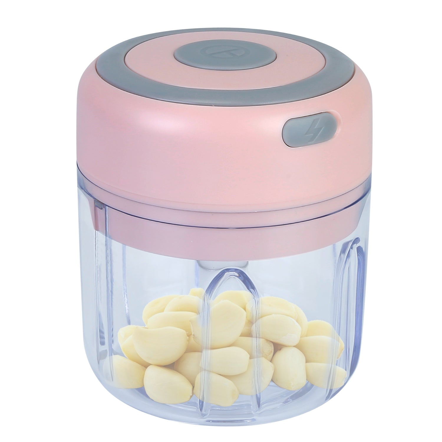 Pink handheld chopper with garlic cloves inside on a white background
