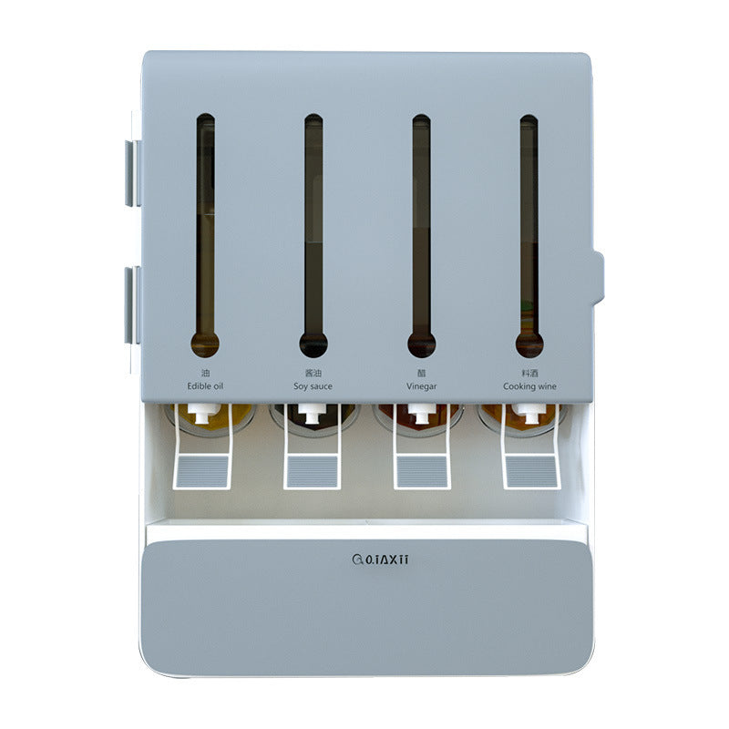 Gray kitchen condiment dispenser with bottle holders on a white background