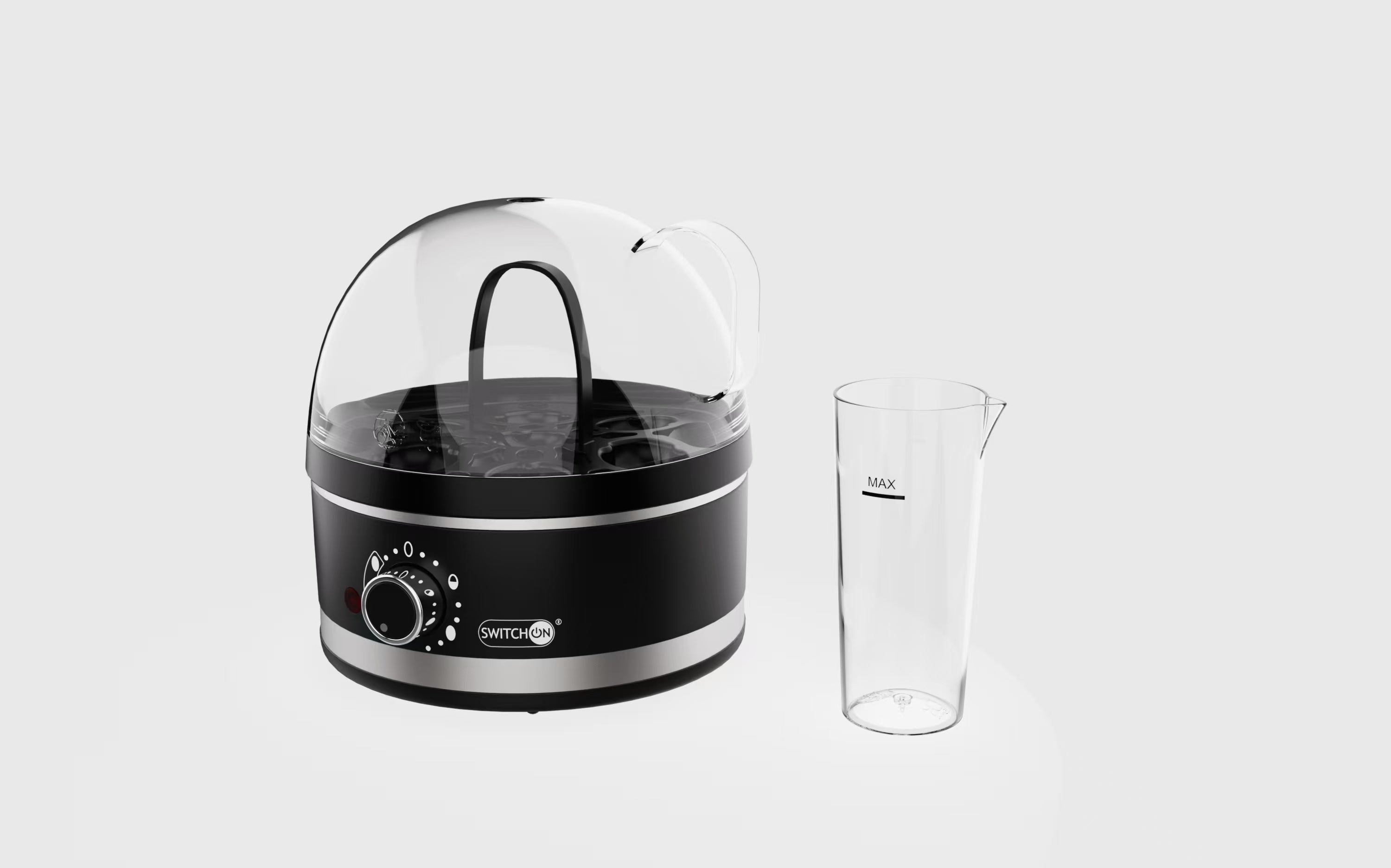 Black and silver food steamer with a clear glass container on a white background